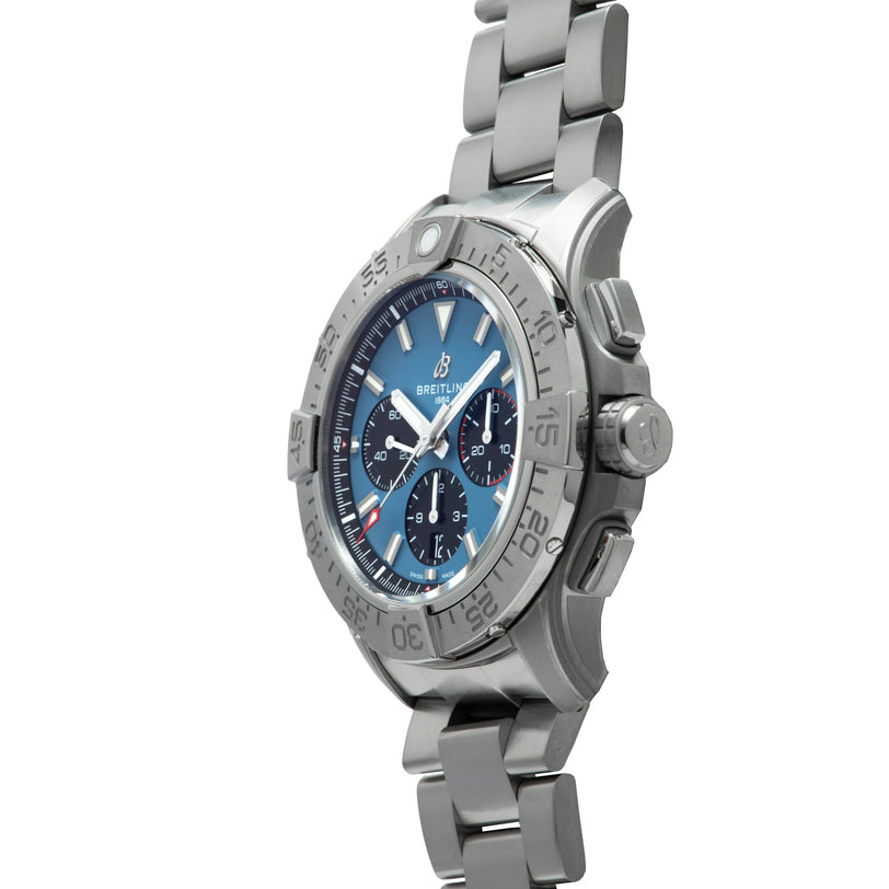 Stainless steel chronograph watch with blue dial, white hour markers, and subdials on matching metal bracelet.