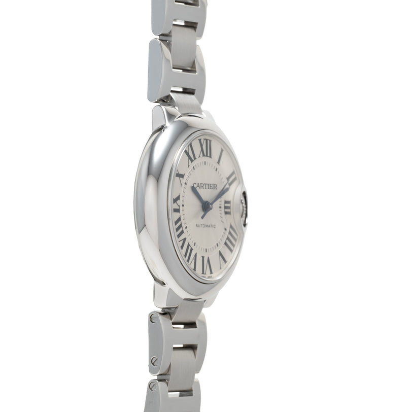 Cartier Ballon Bleu stainless steel watch with white dial, Roman numerals, and matching metal bracelet.