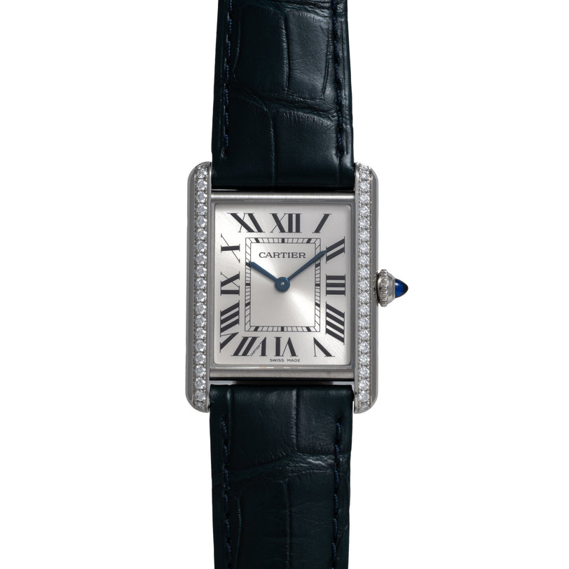 Cartier Tank Must rectangular watch with diamond-set bezel, silver dial with Roman numerals, and black crocodile leather stra