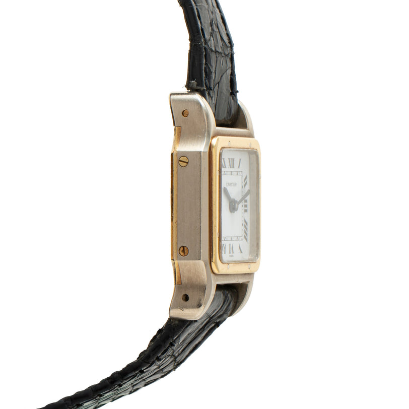 Gold-toned rectangular watch with white dial, Roman numerals, and black crocodile leather strap.