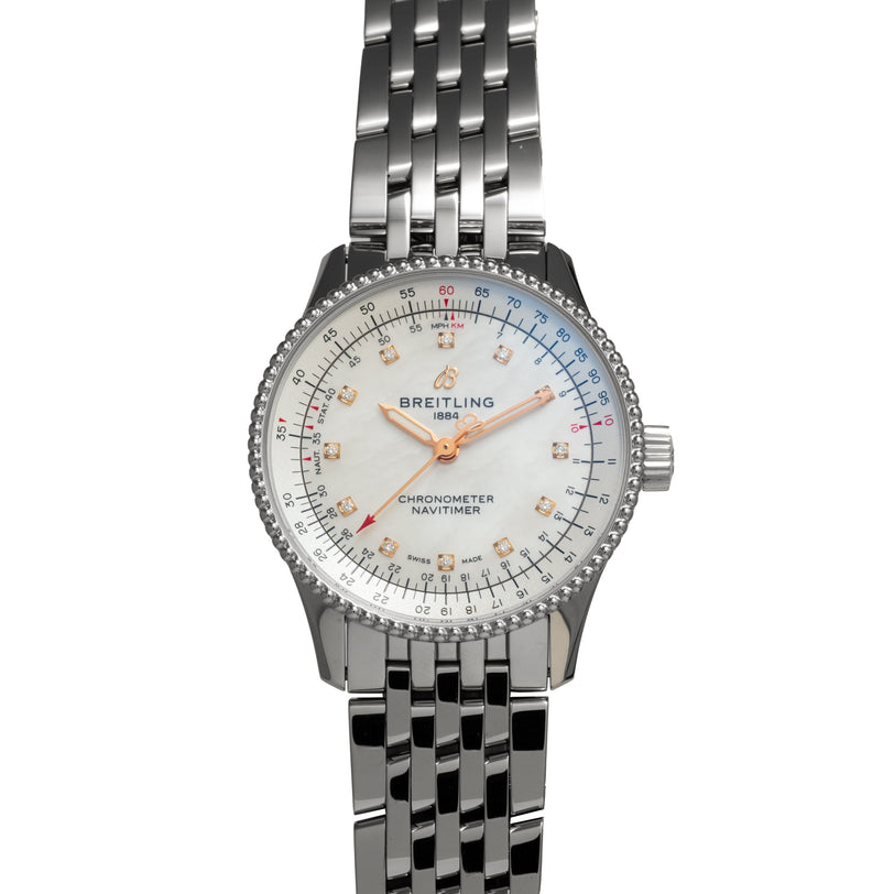 Breitling Navitimer 35 with mother-of-pearl dial, rose gold hands, diamond indices, and stainless steel bracelet.