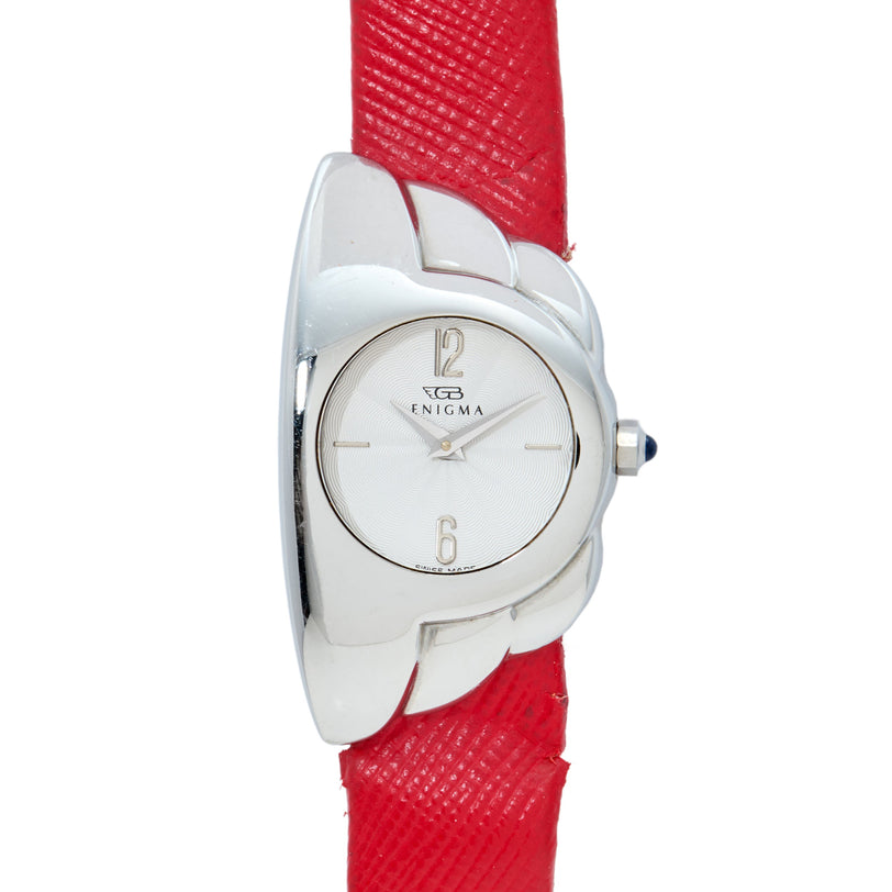 Enigma Claw watch with silver-tone curved case, white dial, and red textured leather strap.