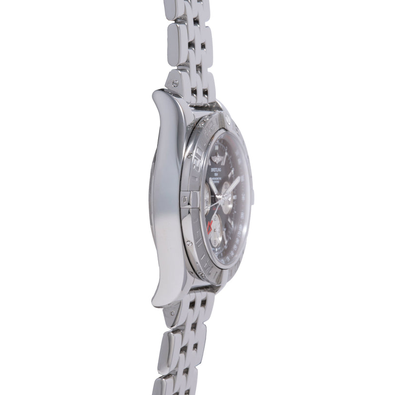Stainless steel chronograph watch with black dial, three subdials, and matching metal bracelet shown from the side.