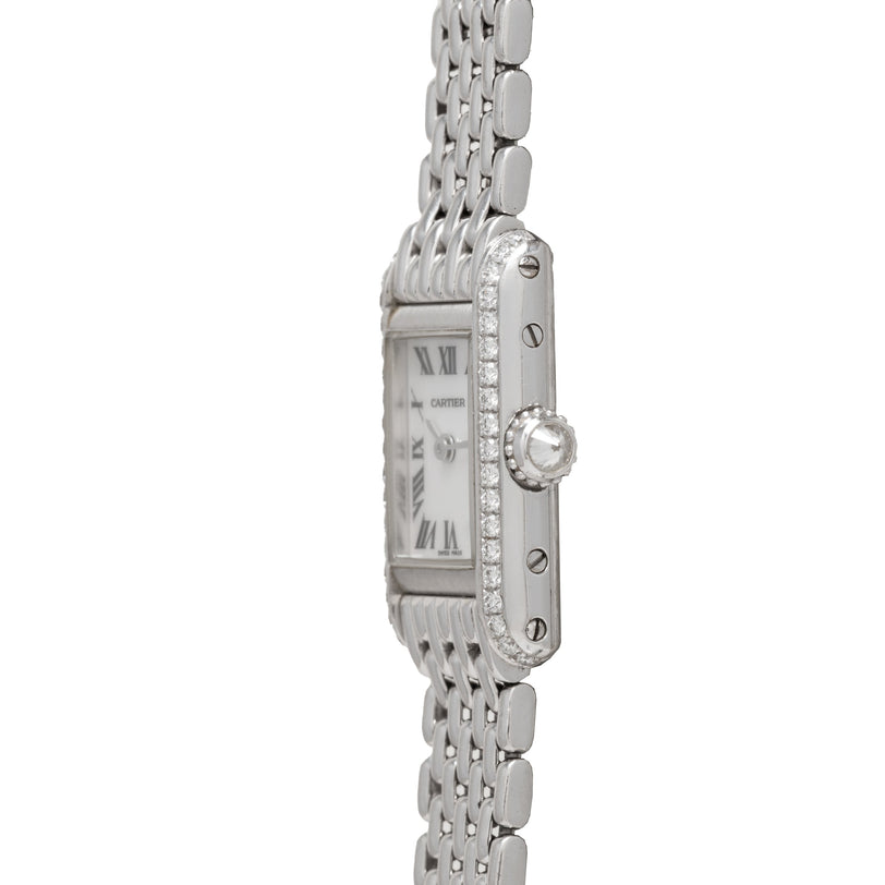 Cartier Tank Mini watch with mother-of-pearl dial, diamond-set bezel, and multi-link steel bracelet.
