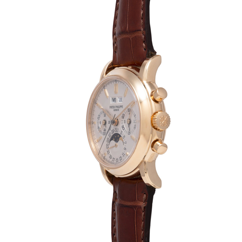 Gold-tone watch with silver dial, perpetual calendar, moonphase display, and brown crocodile leather strap.