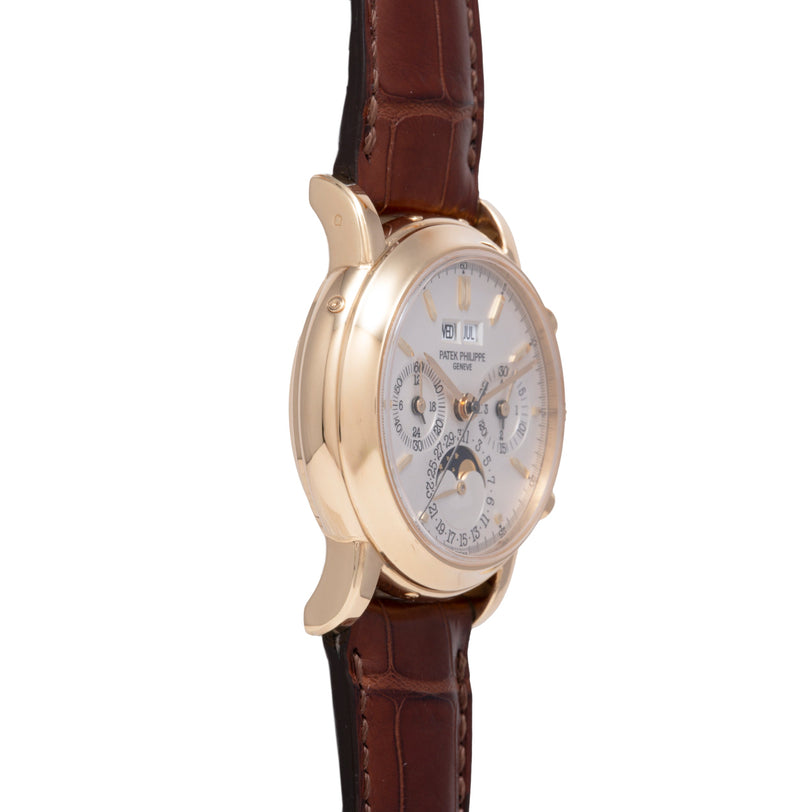 Gold-tone watch with silver dial featuring multiple subdials, date window, moon phase complication, and burgundy leather stra