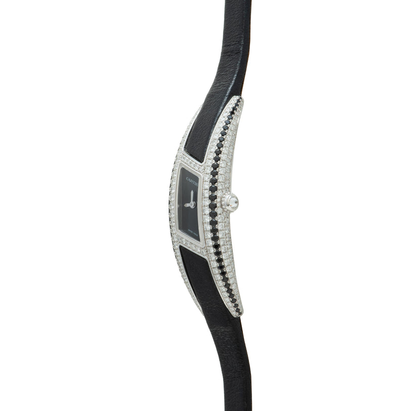 White gold watch with black dial, diamond bezel, and black leather strap.