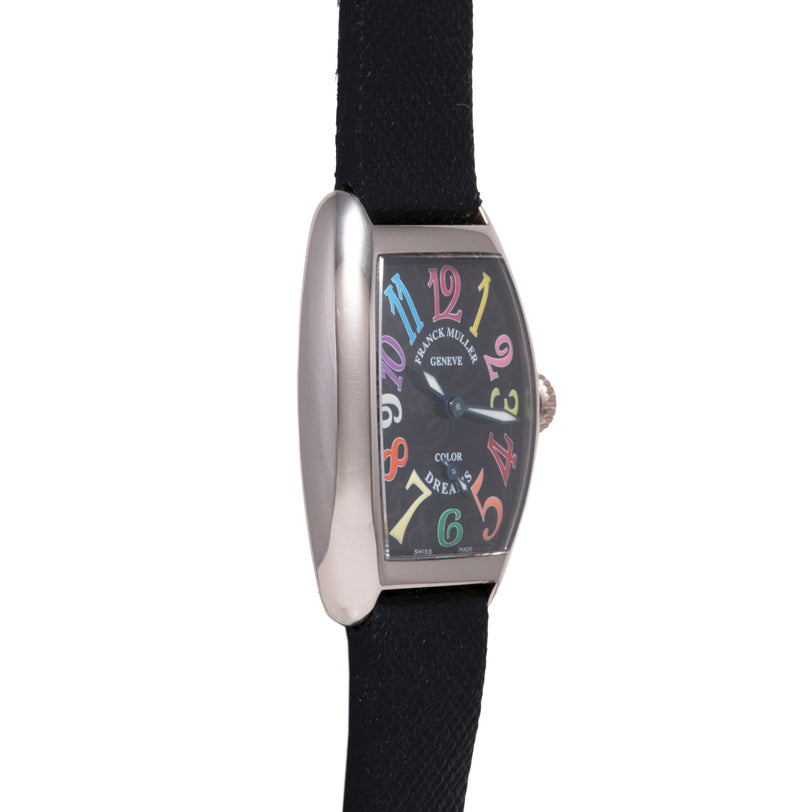 Franck Muller curved tonneau watch with colorful numbered dial, black leather strap, and stainless steel case.
