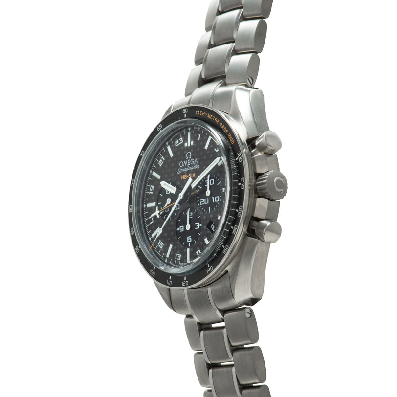 Titanium chronograph watch with black dial, tachymeter bezel, three subdials, and matching bracelet.