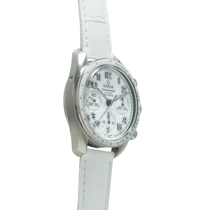 Silver-tone chronograph watch with white dial, Arabic numerals, subdials, and white leather strap.