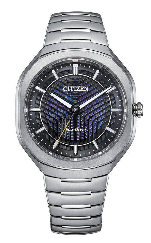 Citizen Eco-Drive PHOTON titanium watch with black dial, blue geometric pattern, and silver-tone bracelet.