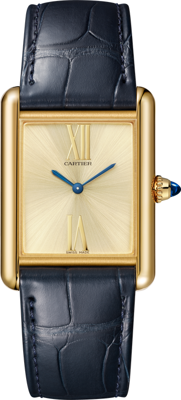 Cartier’s Tank Américaine watch features a square face, blue hands, and a dark blue leather strap.
