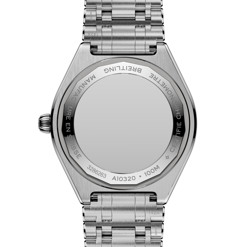 Stainless steel watch with three-link bracelet shown from back, displaying engraved caseback and crown.