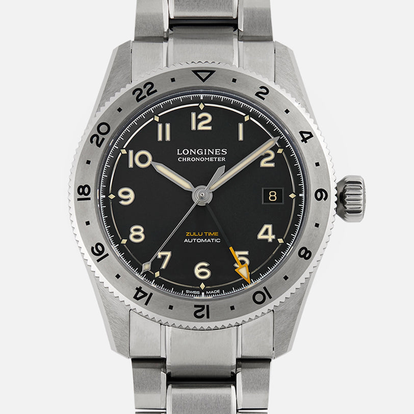 A Longines Spirit Zulu Time Limited Edition For Hodinkee wristwatch by Longines, in stainless steel with a black dial, Arabic numerals, date at 3 o’clock, and silver bezel, displaying the time as 10:08:37.