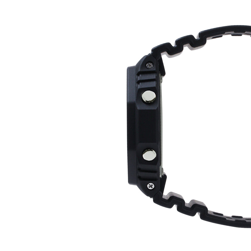 Black resin digital watch with square case, metal accent buttons, and textured band shown from side view.