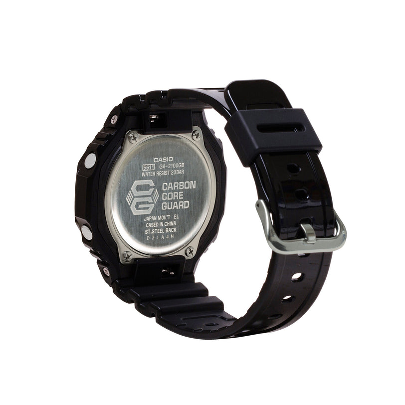 Black Casio G-Shock watch with stainless steel back, black resin band, and digital display showing Carbon Core Guard technolo