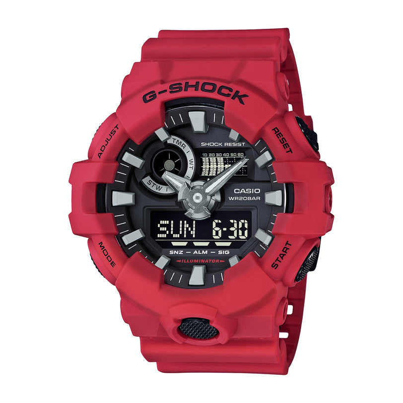 Red resin G-Shock watch with black analog and digital display showing 6:30.