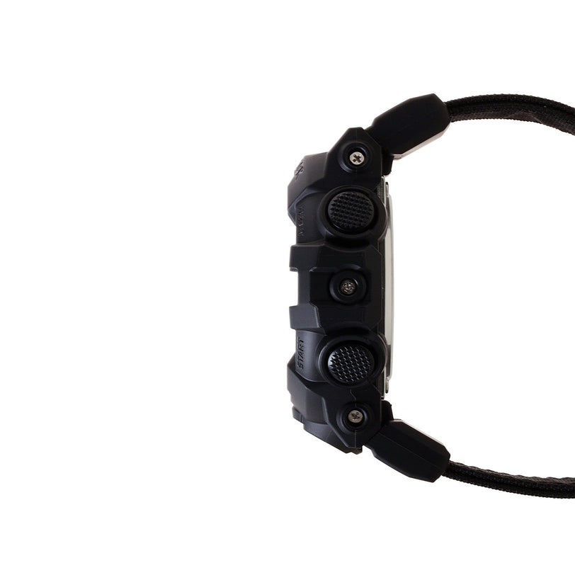Black digital watch with resin case, textured dial, multiple buttons on side, and black fabric strap.