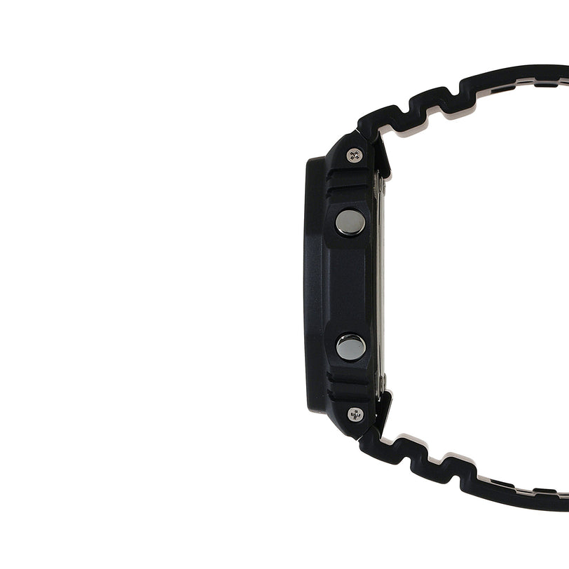 Black resin digital watch with solar icon, side view showing rectangular case and textured band.