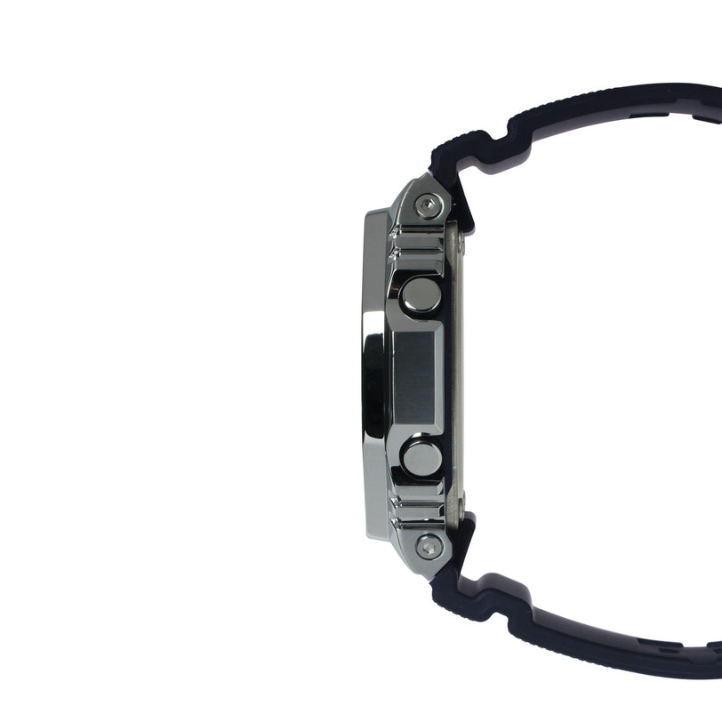 Close-up of a watch with a black strap and metallic case on a white background
