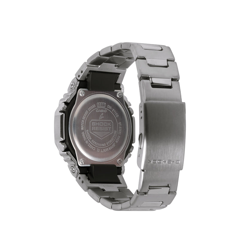 Silver stainless steel G-Shock watch with black resin accents and metal band, shown from the back.