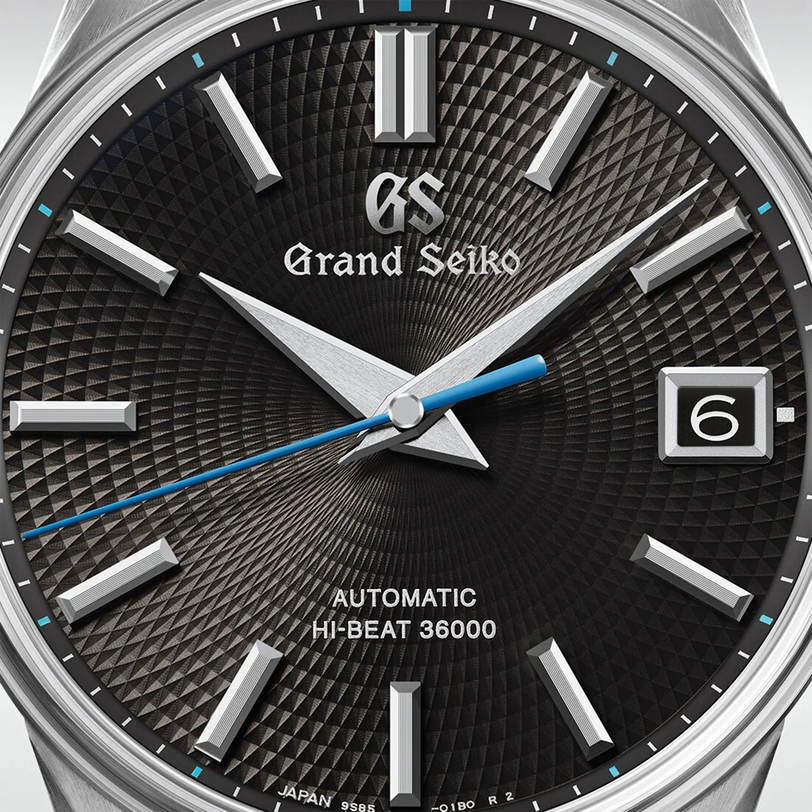 Grand Seiko watch with black dial and silver accents