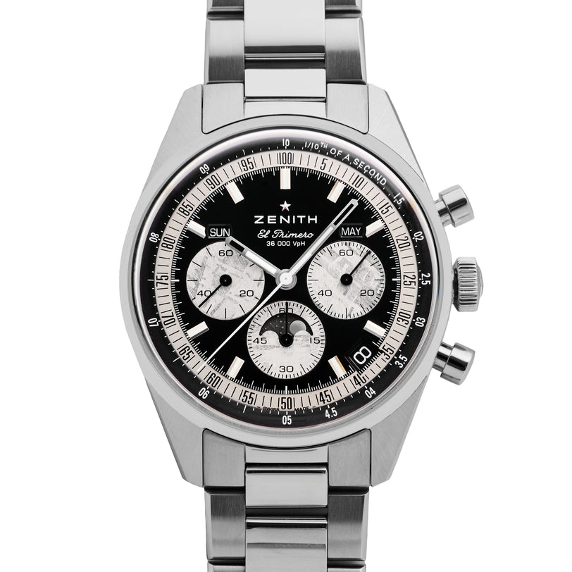 The Zenith Chronomaster Original Triple Calendar Limited Edition For Hodinkee is a stainless steel watch with a black dial, three sub-dials, date displays, and a metal bracelet, showcasing Zeniths modern chronograph design.