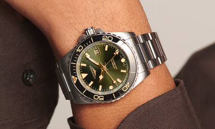 Longines HydroConquest watch with a green dial and steel bracelet