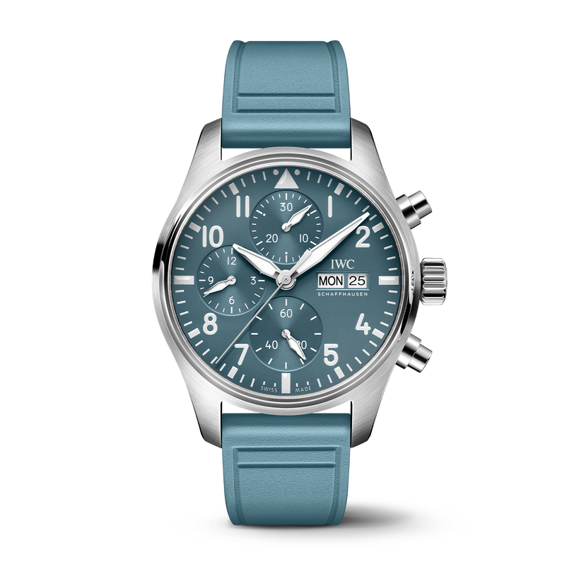 The IWC Schaffhausen Pilot Chronograph Miramar Edition is a silver wristwatch with a teal face and strap, featuring three subdials and a day-date display.