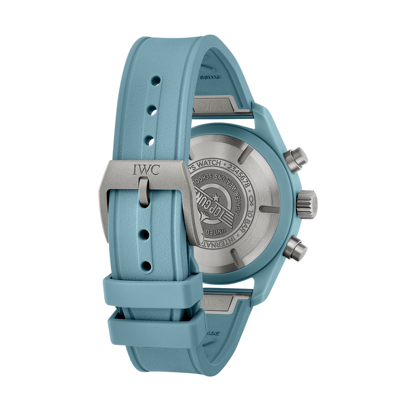 The IWC Schaffhausen Pilot Chronograph Miramar Edition wristwatch is displayed from the back, showcasing its engraved case and buckle.