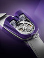 The MB&F HM8 Mark 2 Titanium Limited Edition Watch features a futuristic purple and silver design with a white strap, showcased on a purple gradient background.