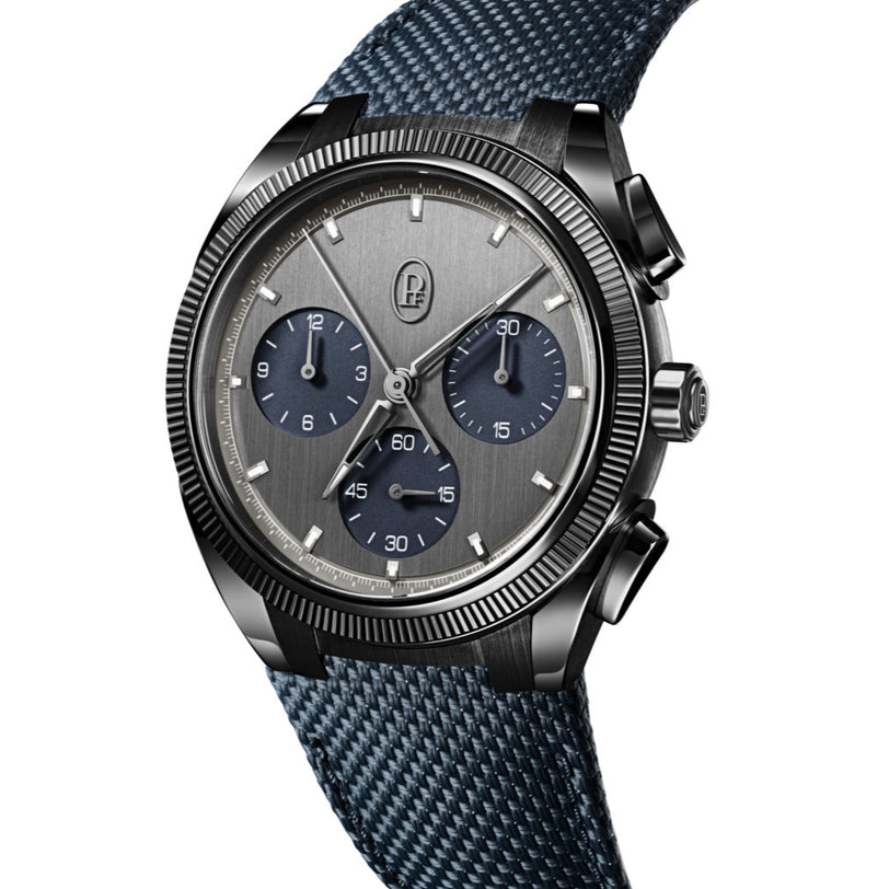 The Parmigiani Fleurier TONDA PF Sport Chronograph features a blue textured strap, silver bezel, and dual blue subdials on a silver face.