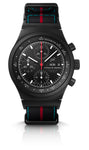 The Porsche Design Chronograph 1 75 Years Porsche Edition features a black chronograph dial, fabric strap, red and blue accents, and a tachymeter bezel.
