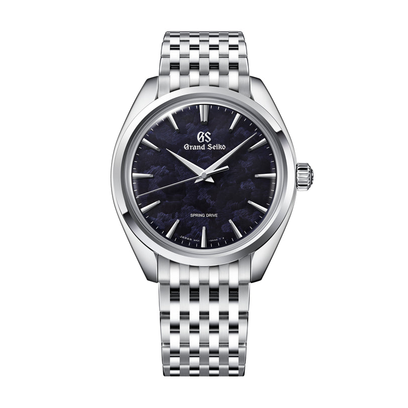 Grand Seiko stainless steel watch with dark blue dial, silver hour markers, and matching metal bracelet.
