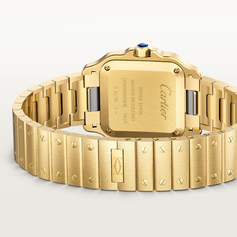 Back view of a Santos De Cartier Watch by Cartier, featuring a gold metal bracelet and engraved details on the case.