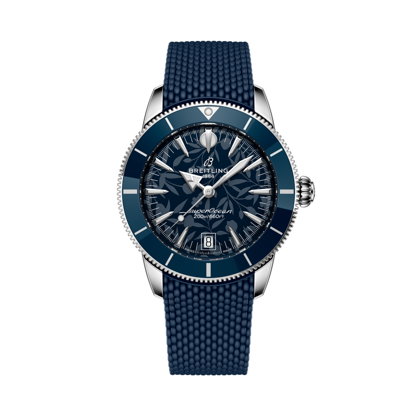 The Breitling Superocean Heritage B31 Automatic 40 Kelly Slater features a blue strap, a patterned blue dial, and silver markers and hands.