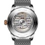 Back view of the Breitling Superocean Heritage B31 Automatic 42 reveals its exposed mechanical movement and detailed engravings on the metal case.