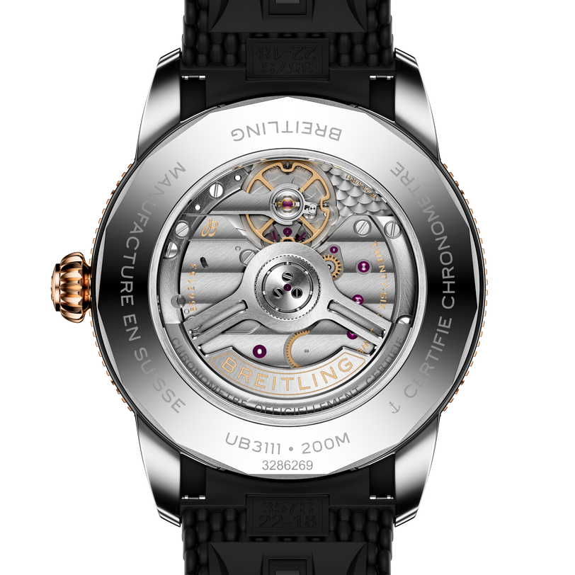 Close-up of the Breitling Superocean Heritage B31 Automatic 42 watch back, showcasing its exposed automatic movement and engraved details.