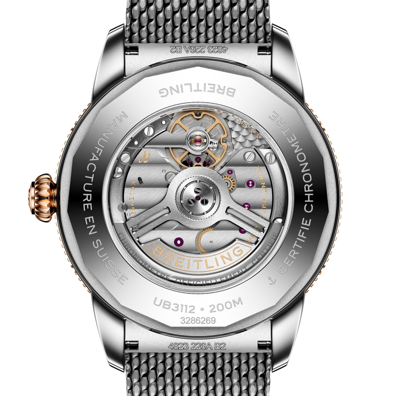 Close-up of the back of the Breitling Superocean Heritage B31 Automatic 44, displaying intricate mechanical movement and engraved details.