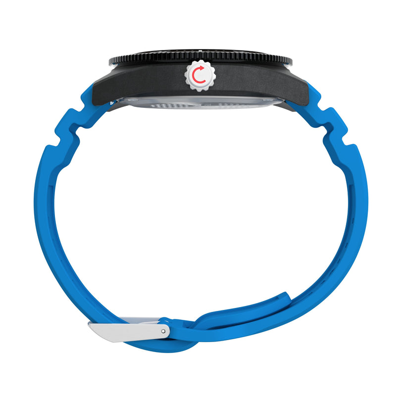 Profile view of the Timex Deepwater Reef 200 XCF dive watch with a black round dial, white crown with red "C," and a bright blue flexible strap. Features 200m water resistance. Shown on a white background.