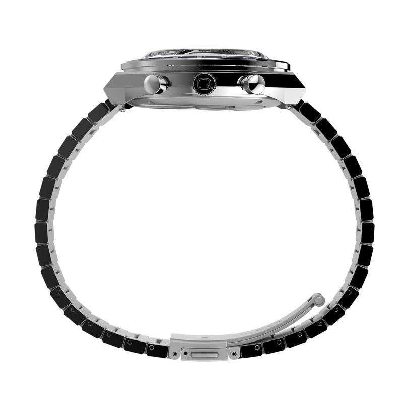 Side view of the Timex Q Chronograph shows its silver stainless steel bracelet, case, crown, and two pushers. The open clasp and band form a partial circle around the watch.