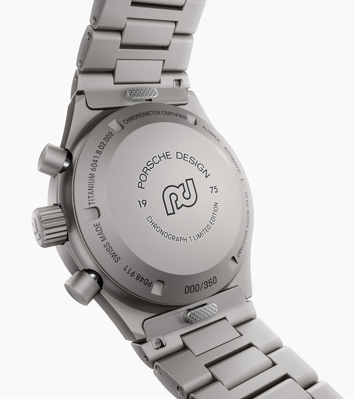 Back view of the Porsche Design Chronograph 1 1975 Limited Edition titanium watch, featuring engraved details and its limited edition number.