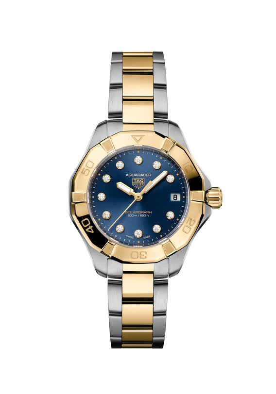 The TAG Heuer Aquaracer Professional 200 Solargraph is a luxury two-tone watch featuring a blue dial, gold bezel, and diamond hour markers.