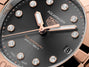 Close-up of a TAG Heuer Aquaracer Professional 200 Solargraph watch, featuring diamond hour markers and a date display at 3 o’clock.