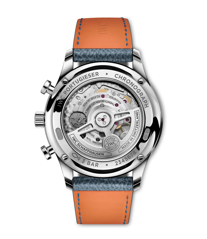 The IWC Schaffhausen Portugieser Chronograph features a transparent case back revealing its detailed movement, complemented by a blue and orange leather strap and polished silver case for a sporty yet elegant look.