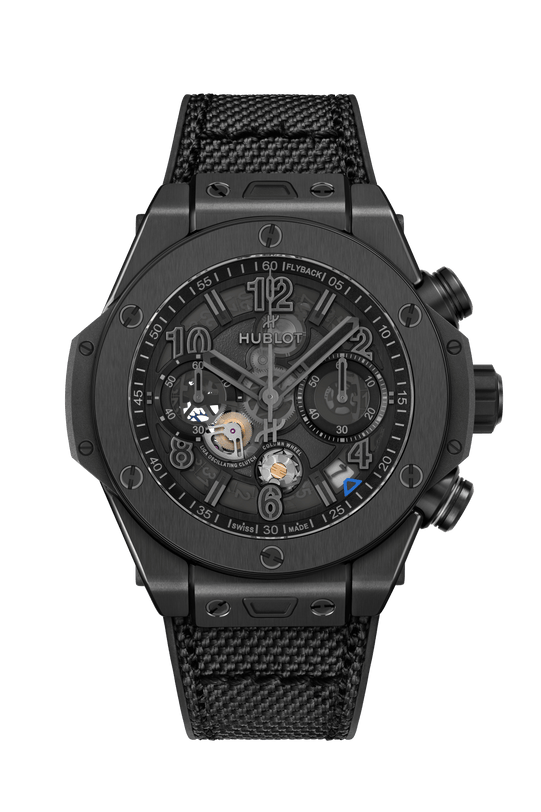 Black chronograph watch with skeleton dial, visible movement, and matching black fabric strap.