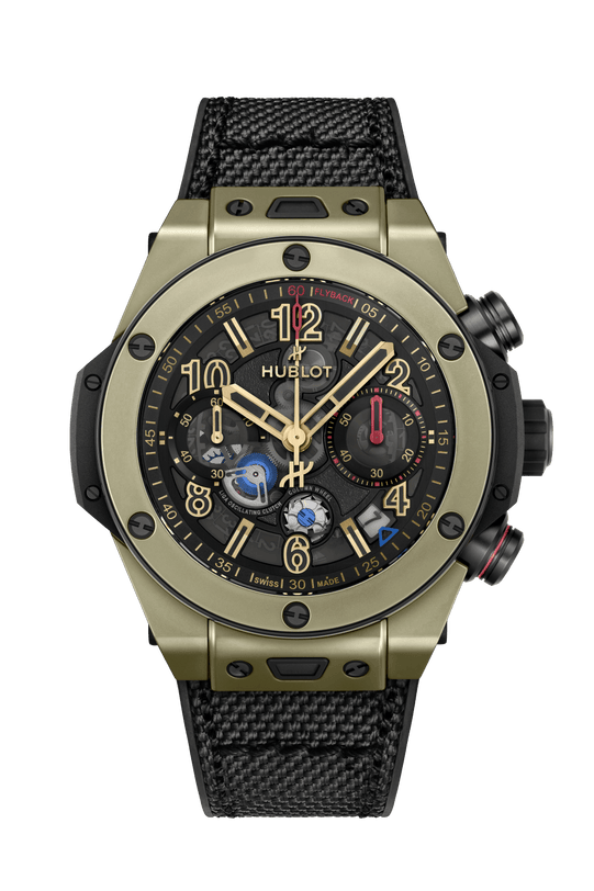 Hublot chronograph watch with gold-tone case, black dial, gold numerals, and black fabric strap.