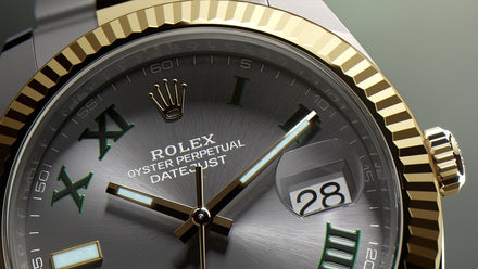 Close-up of a Rolex Oyster Perpetual Datejust watch showing the date and Roman numeral hour markers.
