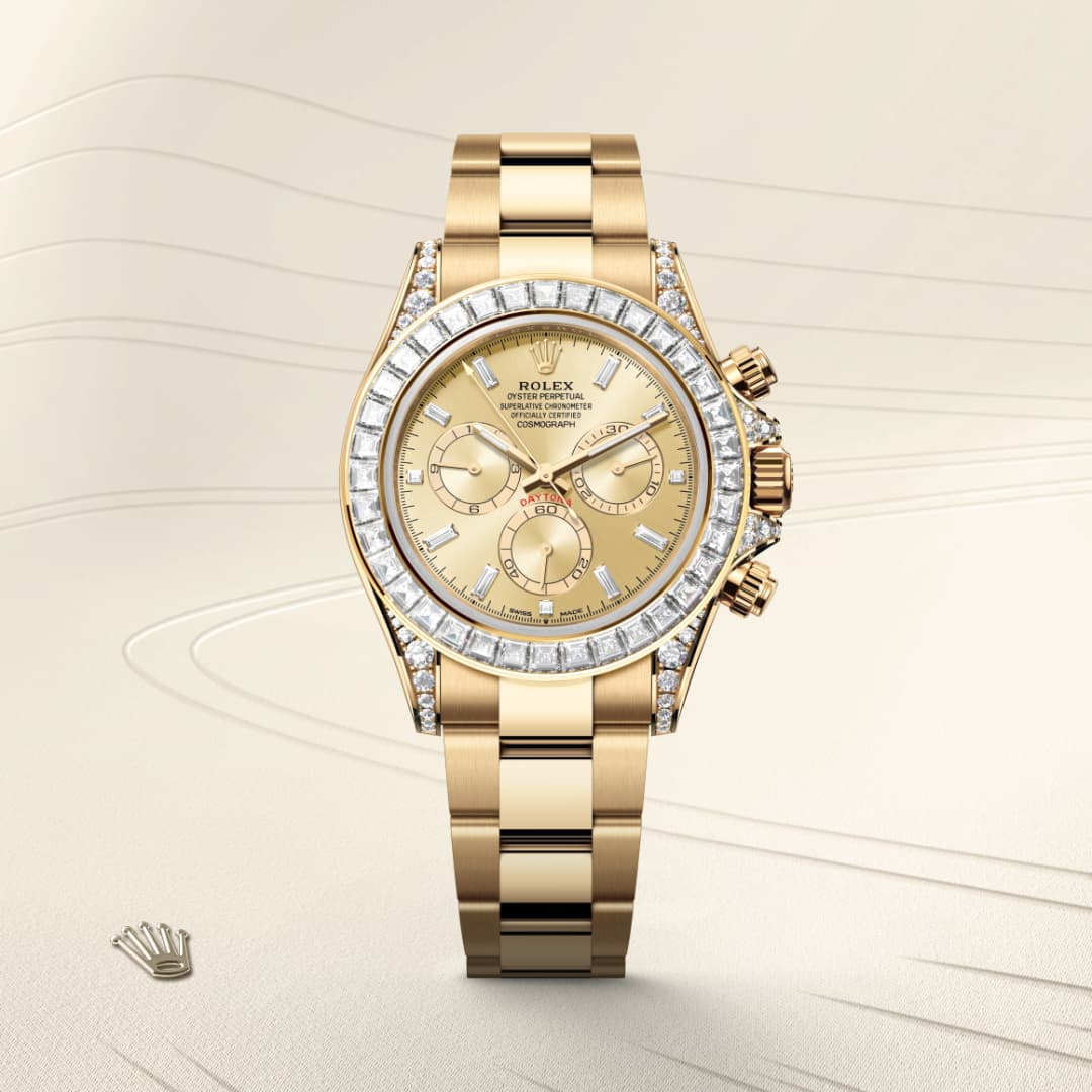 A gold Rolex watch with diamond bezel and three subdials, displayed on a light, textured background.