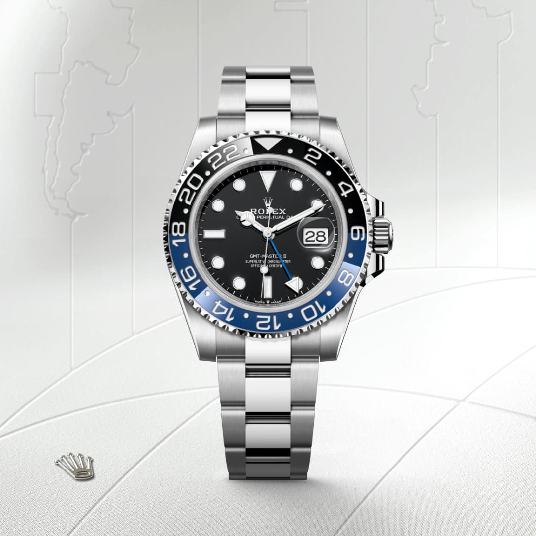 A Rolex GMT-Master II watch with a black and blue bezel displayed on a silver bracelet.